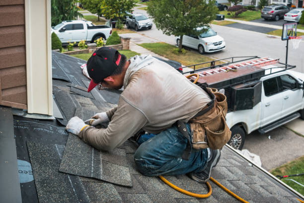 Professional Roof Replacement technician working in Wallis, TX